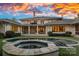 Beautiful backyard featuring a pool, hot tub, and covered patio with stunning sunset views at 19117 Davidson Concord Rd, Davidson, NC 28036