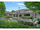 Stunning backyard featuring a pool, spa, outdoor seating, and lush landscaping at 19117 Davidson Concord Rd, Davidson, NC 28036