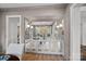 Dining room sideboard with mirrored door and decorative display at 19117 Davidson Concord Rd, Davidson, NC 28036