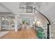 Spacious foyer with grand staircase, hardwood floors and decorative accents at 19117 Davidson Concord Rd, Davidson, NC 28036