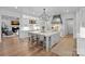 Modern kitchen with island, bar seating, and stainless steel appliances at 19117 Davidson Concord Rd, Davidson, NC 28036