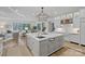 Spacious open-concept kitchen featuring a large island, stainless steel appliances, and ample cabinet space at 19117 Davidson Concord Rd, Davidson, NC 28036