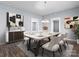 Elegant dining room with modern decor, stylish lighting, and ample seating at 200 N Martin Luther King Jr N Ave, Salisbury, NC 28144
