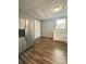 Spacious kitchen featuring stainless steel refrigerator, plenty of cabinets, and hardwood floors at 200 N Martin Luther King Jr N Ave, Salisbury, NC 28144