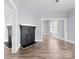 Spacious living area with beautiful floors and black fireplace at 200 N Martin Luther King Jr N Ave, Salisbury, NC 28144