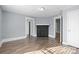 Cozy living room with modern floors, fireplace, and neutral paint, creating a welcoming space at 200 N Martin Luther King Jr N Ave, Salisbury, NC 28144