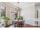 Cozy breakfast nook with a round table, natural light, and views of the outdoors at 2508 Shaggy Bark Ct, Belmont, NC 28012