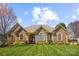 Charming brick home featuring manicured lawn, symmetrical design, and inviting entrance at 2508 Shaggy Bark Ct, Belmont, NC 28012