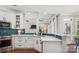 Bright kitchen with white cabinets, quartz counters, stainless appliances, and open design at 2508 Shaggy Bark Ct, Belmont, NC 28012