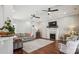Inviting living room with hardwood floors, fireplace, and comfortable seating arrangement at 2508 Shaggy Bark Ct, Belmont, NC 28012