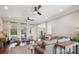 Bright living room features hardwood floors, large windows, neutral tones, and open floor plan at 2508 Shaggy Bark Ct, Belmont, NC 28012