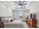 Cozy main bedroom with tray ceiling, neutral tones, large window, and comfortable furnishings at 2508 Shaggy Bark Ct, Belmont, NC 28012