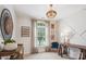 Stylish office featuring modern decor, a comfortable chair, and ample natural light creating an inviting and productive workspace at 2508 Shaggy Bark Ct, Belmont, NC 28012