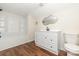 Well-lit bathroom with modern fixtures, vanity with storage, and shower and tub combo at 257 3Rd Se Ave, Hickory, NC 28602