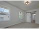 Bedroom features two windows and a sliding barn door leading to the bathroom at 257 3Rd Se Ave, Hickory, NC 28602