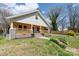 Charming home with a covered front porch and landscaped yard at 257 3Rd Se Ave, Hickory, NC 28602