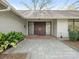 Stunning entryway with double doors and brick accents at 3301 Mountainbrook Rd, Charlotte, NC 28210