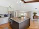 Spacious kitchen features a large island, stainless steel appliances, and an adjacent dining area at 3301 Mountainbrook Rd, Charlotte, NC 28210