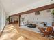 Expansive living area with hardwood floors and modern furnishings at 3301 Mountainbrook Rd, Charlotte, NC 28210