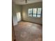 This bedroom features a large window with natural light and neutral walls at 3748 Caribou Dr, Sherrills Ford, NC 28673