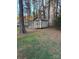Outdoor storage shed in backyard with wooded surroundings and easy access for tools and equipment at 3748 Caribou Dr, Sherrills Ford, NC 28673