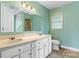 Bright bathroom with double sinks, spacious countertops and a large mirror at 3772 Sandy Ford Rd, Hickory, NC 28602