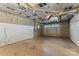 Spacious unfinished garage with a concrete floor and cinder block walls at 3772 Sandy Ford Rd, Hickory, NC 28602