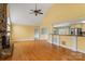 Bright living room with wood floors, stone fireplace, open layout, and lots of natural light at 3772 Sandy Ford Rd, Hickory, NC 28602