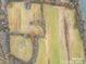 Overhead view of land parcel with trees, river access, and open fields at 3A Riverlane Rd, Rock Hill, SC 29730