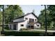 Exterior of a modern two-story barn style home with black trim, an overhead balcony, and an attached garage at 3A Riverlane Rd, Rock Hill, SC 29730