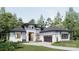 Beautiful exterior of a bright modern home with black trim, lush landscaping, and a two-car garage at 3A Riverlane Rd, Rock Hill, SC 29730