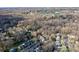 Extensive neighborhood with houses nestled among dense trees, highlighting a serene residential environment at 4351 Woodglen Ln, Charlotte, NC 28226