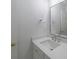 Bathroom with a modern sink, mirror, and fixtures at 4351 Woodglen Ln, Charlotte, NC 28226
