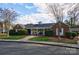 Community clubhouse with manicured landscaping at 4351 Woodglen Ln, Charlotte, NC 28226