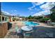 Inviting community pool area with ample seating, perfect for relaxing and enjoying sunny days at 4351 Woodglen Ln, Charlotte, NC 28226
