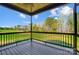 Inviting back porch with scenic views of the backyard at 437 Cedar Grove Rd, Clover, SC 29710