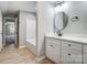 Cozy bathroom with a tub-shower, vanity and wood-look floors at 437 Cedar Grove Rd, Clover, SC 29710