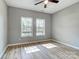 Sun-filled bedroom featuring two windows that provide a beautiful view and hardwood floors at 437 Cedar Grove Rd, Clover, SC 29710