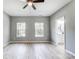 A bedroom featuring natural light streaming through the windows and neutral wall colors at 437 Cedar Grove Rd, Clover, SC 29710