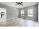 A bedroom featuring natural light streaming through the windows and neutral wall colors at 437 Cedar Grove Rd, Clover, SC 29710