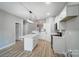 Modern kitchen featuring an island, stainless steel appliances, and white cabinetry at 437 Cedar Grove Rd, Clover, SC 29710