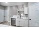 Kitchen area featuring stainless steel appliances and white cabinets at 437 Cedar Grove Rd, Clover, SC 29710