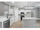 Well-equipped kitchen featuring stainless steel appliances, and an island with bar seating at 437 Cedar Grove Rd, Clover, SC 29710