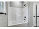 Bathroom featuring a stylish tub shower with black hardware and a window allowing for natural light at 437 Cedar Grove Rd, Clover, SC 29710
