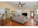 Spacious living room with hardwood floors, fireplace, and natural light, perfect for gatherings at 4501 Brandie Glen Rd, Charlotte, NC 28269