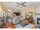 Open living space with hardwood floors, connecting living room, dining area, and kitchen for easy entertaining at 4501 Brandie Glen Rd, Charlotte, NC 28269