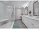 Primary bathroom suite featuring glass shower, double vanity, and sleek fixtures at 463 Lake Wylie Rd, Belmont, NC 28012