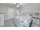 Bedroom featuring neutral paint, carpeted floors, and ensuite bathroom at 463 Lake Wylie Rd, Belmont, NC 28012