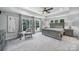 Primary bedroom featuring tray ceilings, neutral paint, carpet flooring, with lots of natural light at 463 Lake Wylie Rd, Belmont, NC 28012