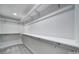 Walk-in closet featuring carpeted floors and plenty of hanging storage at 463 Lake Wylie Rd, Belmont, NC 28012